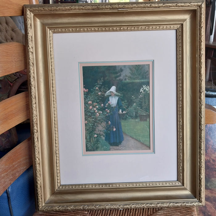 NICELY FRAMED PRINT OF LADY IN GARDEN