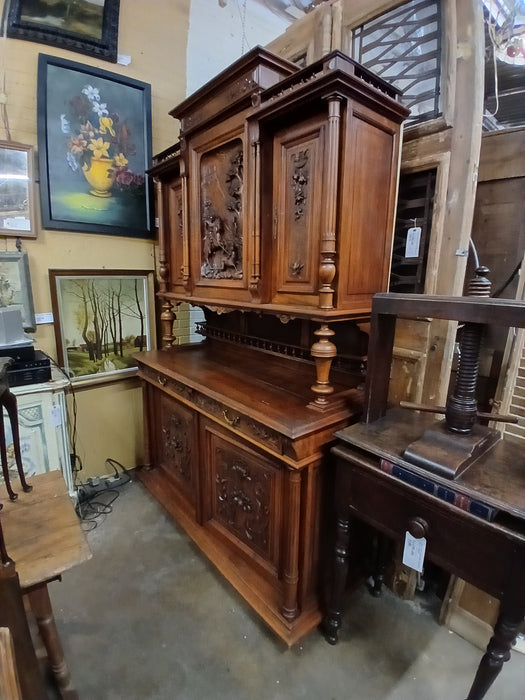 HENRI II  WALNUT BUFFET WITH CARVED HUNTER