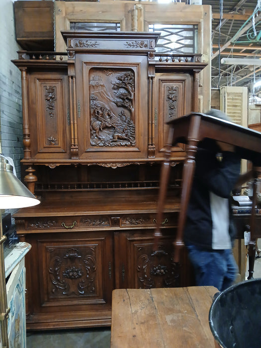 HENRI II  WALNUT BUFFET WITH CARVED HUNTER