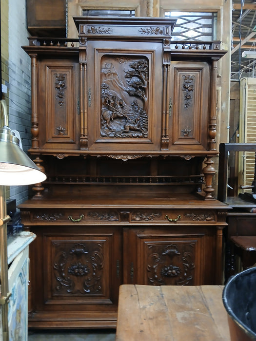 HENRI II  WALNUT BUFFET WITH CARVED HUNTER