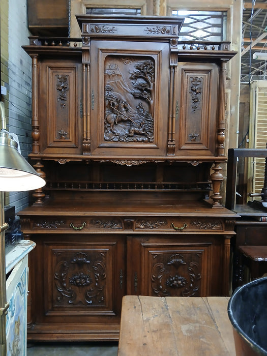 HENRI II  WALNUT BUFFET WITH CARVED HUNTER