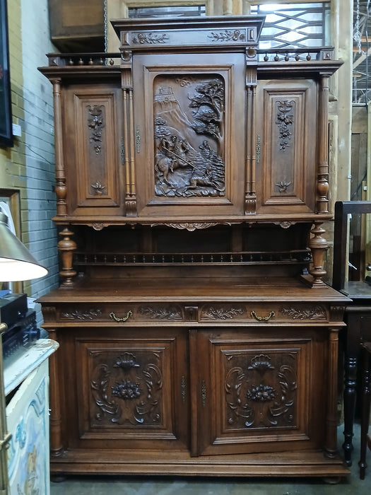 HENRI II  WALNUT BUFFET WITH CARVED HUNTER