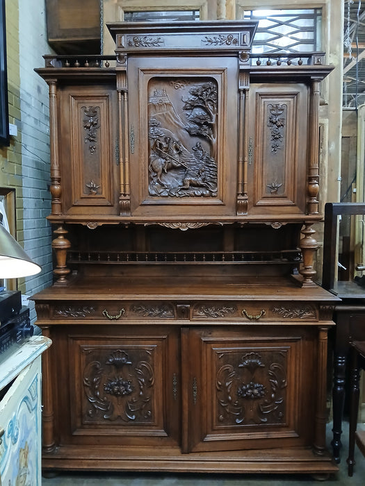 HENRI II  WALNUT BUFFET WITH CARVED HUNTER