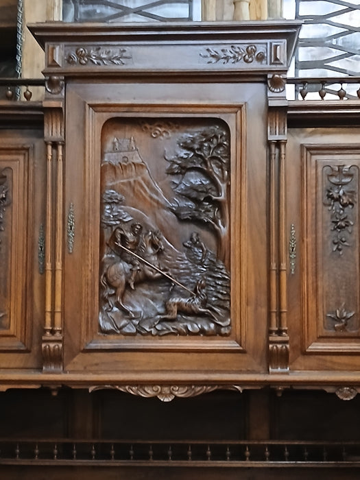 HENRI II  WALNUT BUFFET WITH CARVED HUNTER