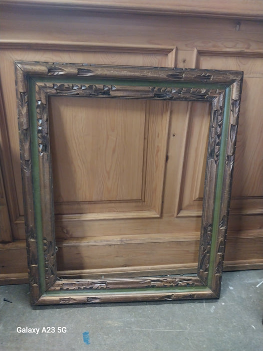 GREEN AND GOLD CARVED WOOD FRAME