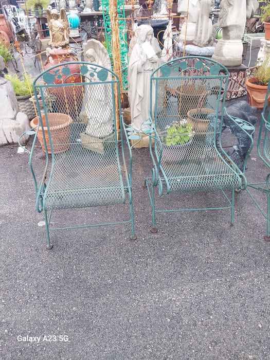 PAIR OF VINTAGE GREEN IRON ROCKING LAWN CHAIRS