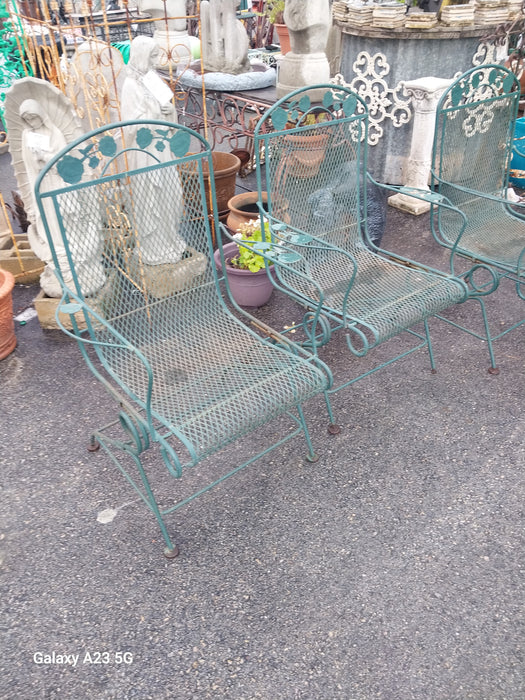 PAIR OF VINTAGE GREEN IRON ROCKING LAWN CHAIRS