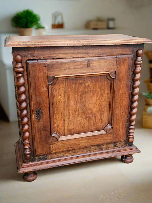 LOUIS XIII OAK SINGLE DOOR CABINET WITH BARLEY TWIST PILLASTERS