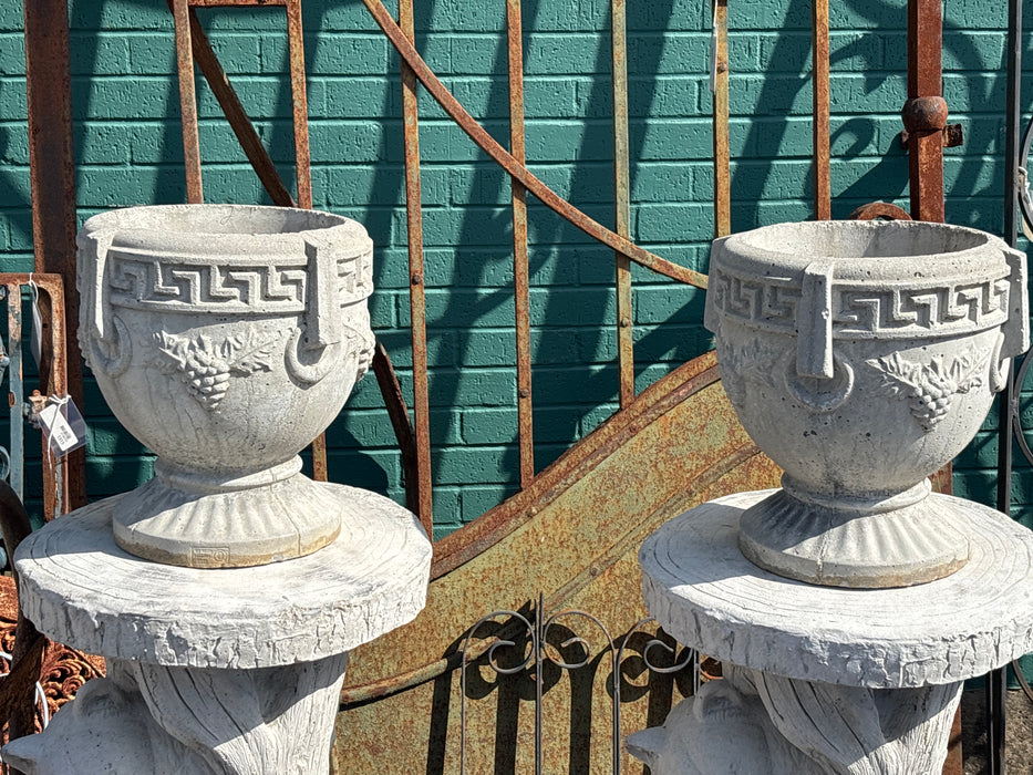 PAIR OF CONCRETE GRAPE PLANTERS