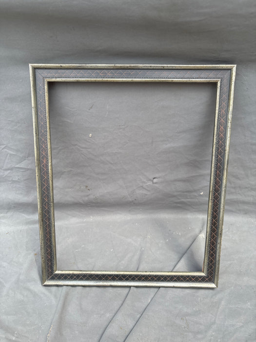 SMALL BROWN FRAME WITH INCISED DIAMOND SHAPER