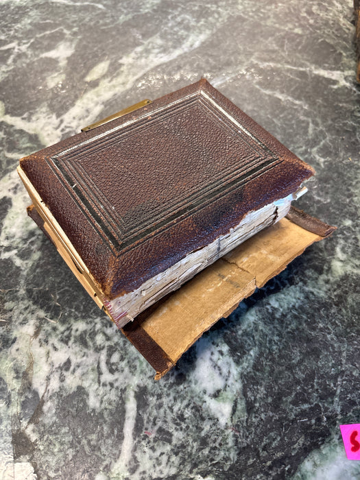 SMALL EARLY EMBOSSED PHOTO ALBUM WITH AS FOUND BINDING