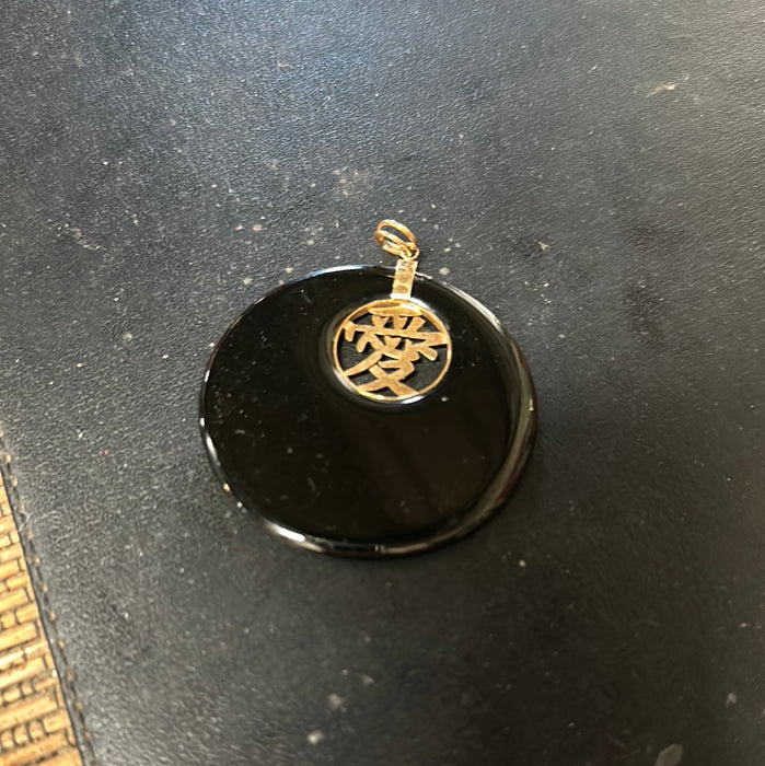 BLACK DISK WITH 14K GOLD