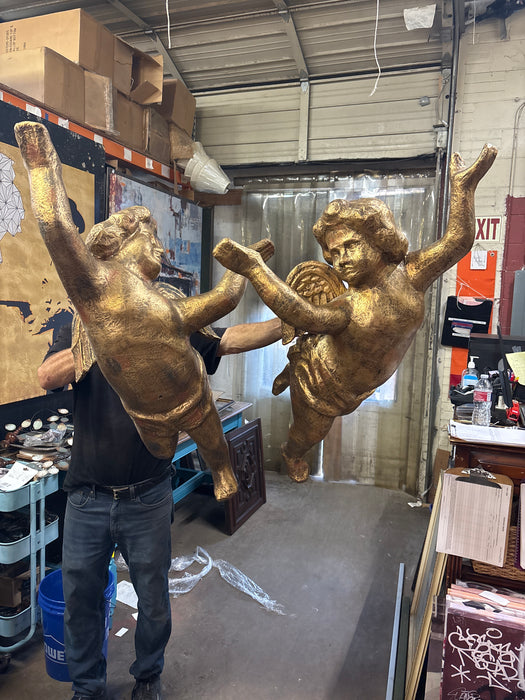 PAIR OF FOAM GOLD CHERUBS 1 OF 2