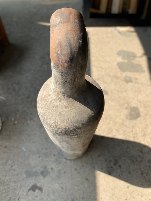 TALL TERRACOTTA JUG WITH CARVED SPOUT