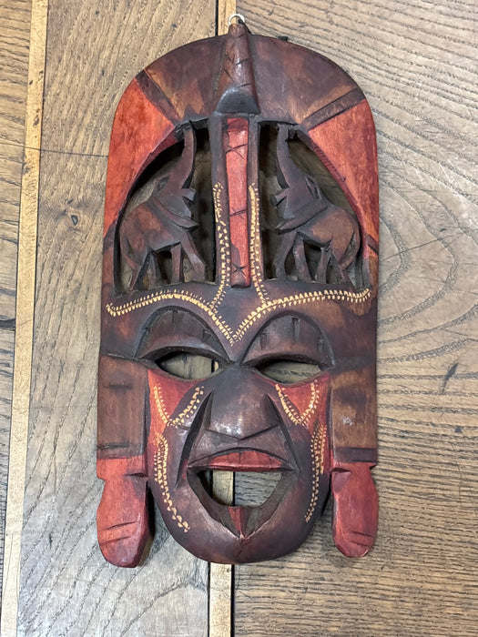 RED AFRICAN MASK WITH ELEPHANTS