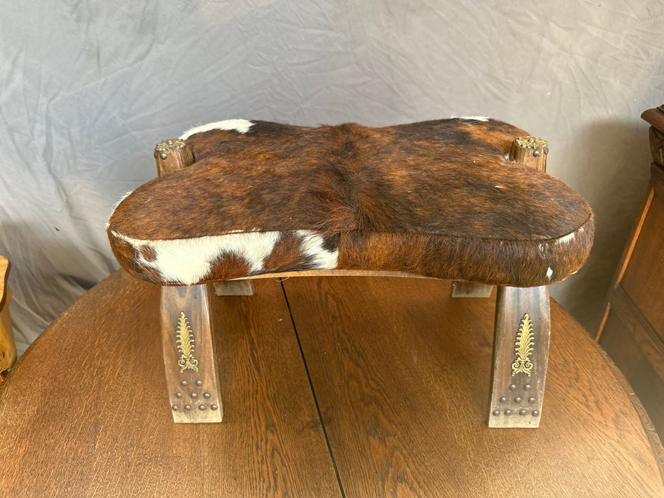COWHIDE COVERED CAMEL SADDLE