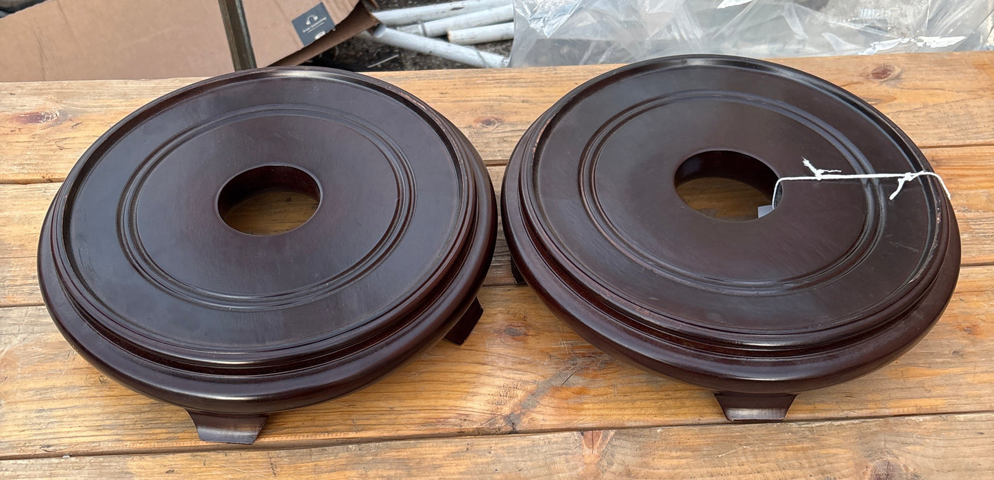 PAIR OF ROUND BLACK WOOD ASIAN BASE