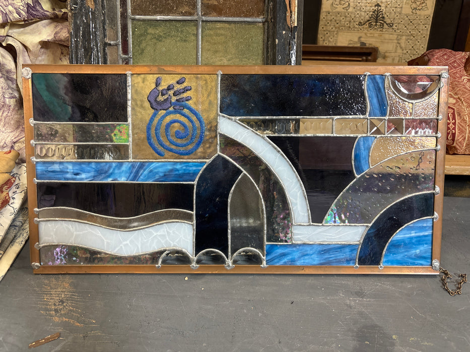 SMALL BLUE AND PURPLE STAINED GLASS WINDOW WITH HAND