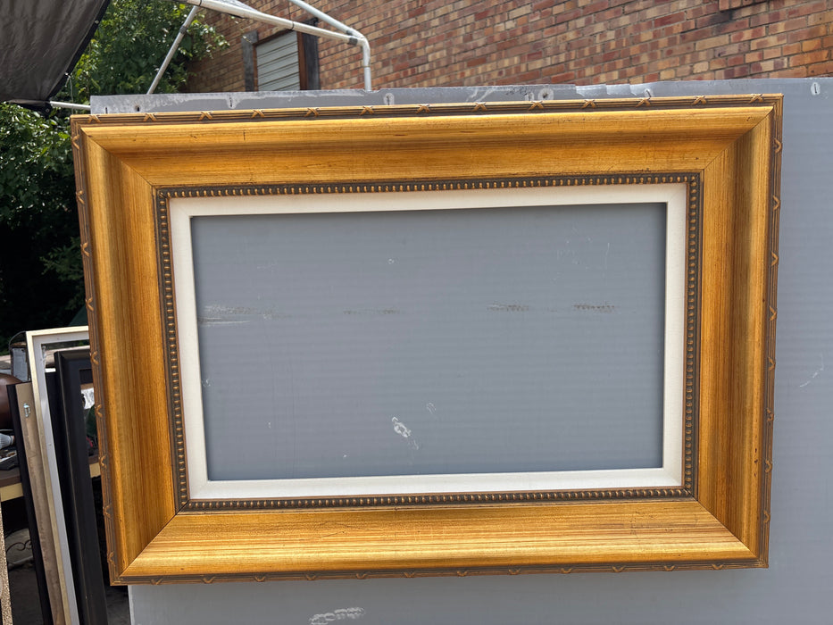 MEDIUM GILT FLARED FRAME WITH BEADED LINER AND LINEN FILET