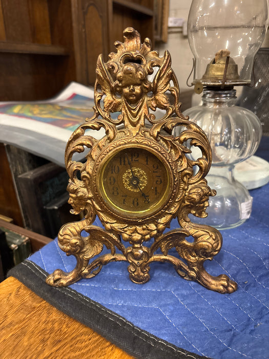 SMALL VICTORIAN CAST IRON CLOCK
