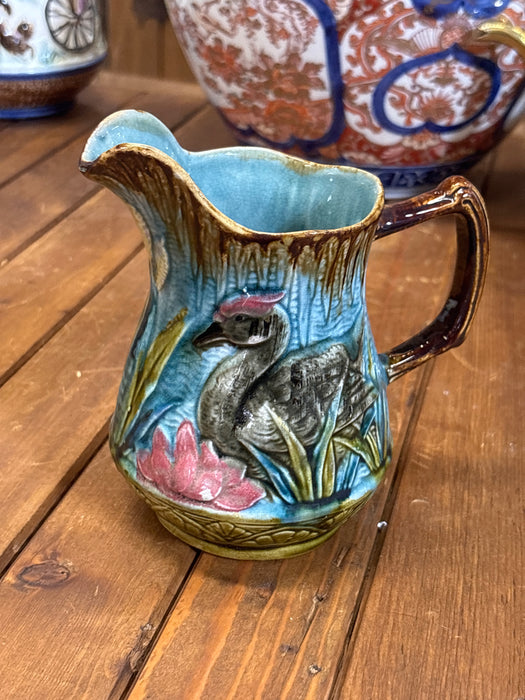 SMALL MAJOLICA BLUE PITCHER WITH BIRD