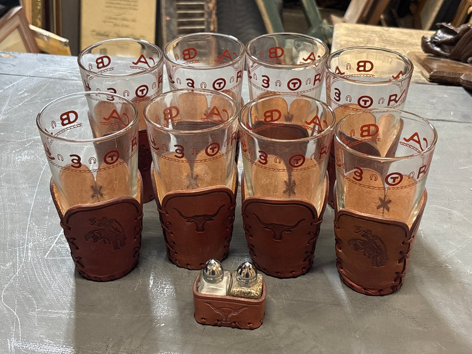 SET OF 8 MID CENTURY GLASSES WITH BRANDING SYMBOLS AND LEATHER HOLDERS