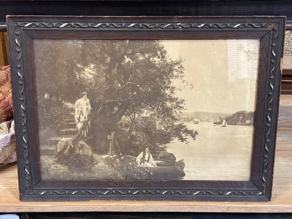BLACK OAK FRAMED SEPIA TONE PRINT OF COUPLE RENDEZVOUS ON BOAT
