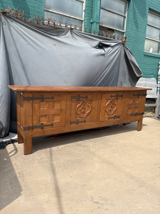 RUSTIC OAK SIDEBOARD WITH QUATRIFOILS AND CARVING