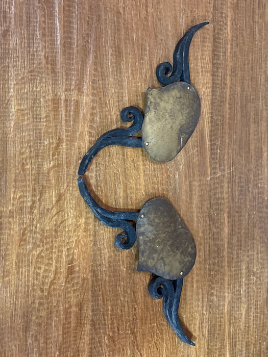 PAIR OF BRASS AND IRON HEART SHAPED ACCOUTREMENT
