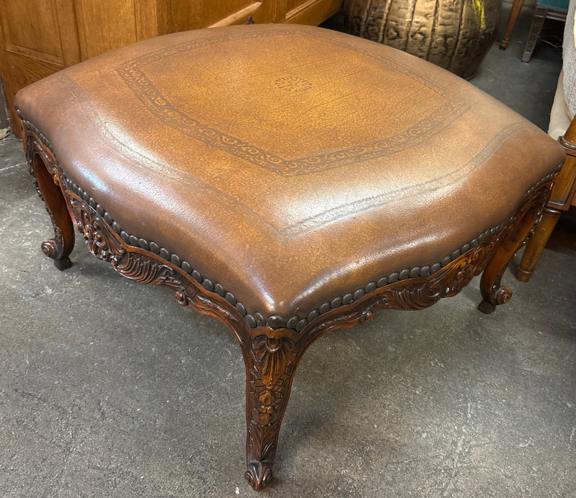 THEODORE ALEXANDER CARVED FRENCH STYLE OTTOMAN WITH LEATHER