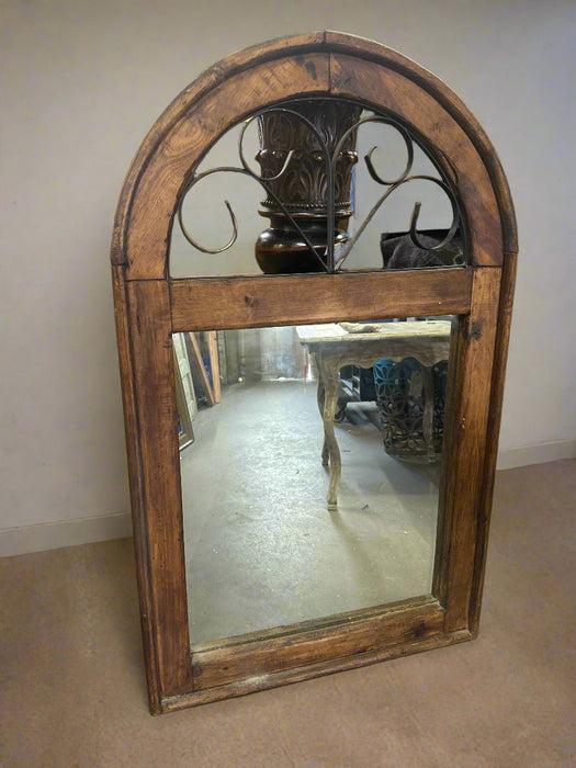 ARCHED WOOD AND IRON MIRROR