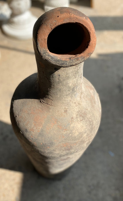 TALL TERRACOTTA JUG WITH CARVED SPOUT