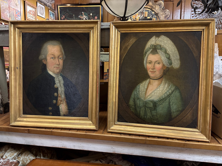 PAIR OF 18TH CENTURY GOLD FLARED FRAMED PORTRAITS OF MAN AND WOMAN IN GREEN