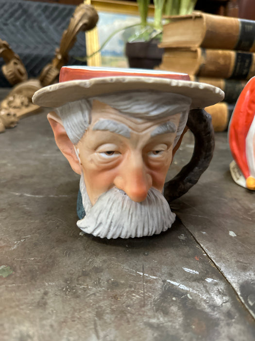 PORTRAIT MUG OF MUSTACHED MAN
