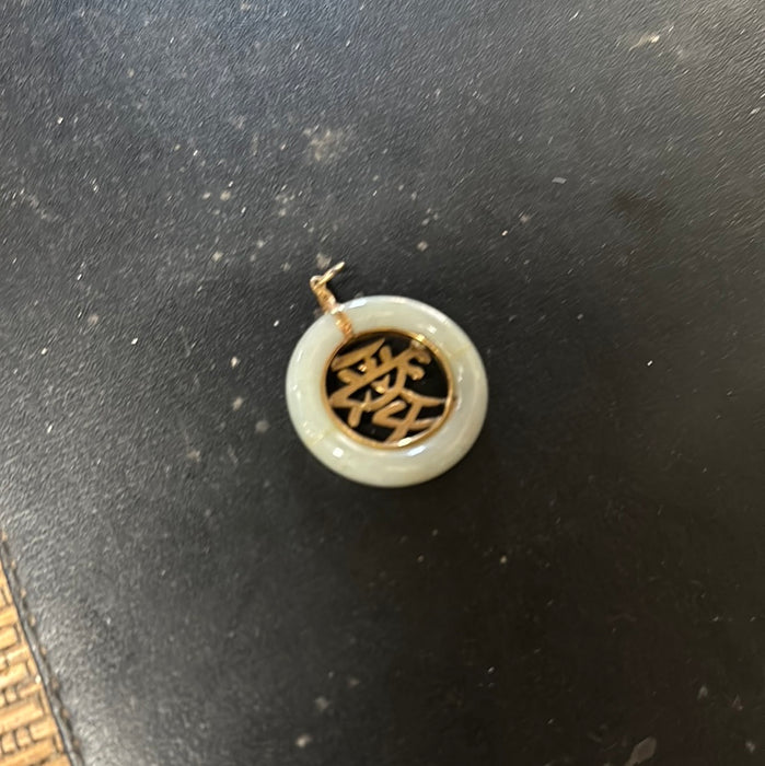 SMALL JADE AND 14K GOLD DISC