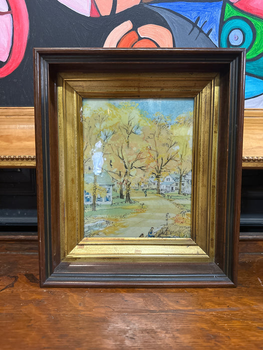 FRAMED PAINTING OF A NEIGHBORHOOD IN NICE FRAME