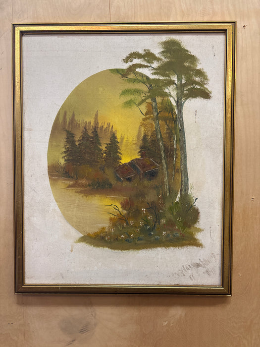 GOLD FRAMED OIL PAINTING OF BUILDING NEXT TO STREAM AT SUNSET