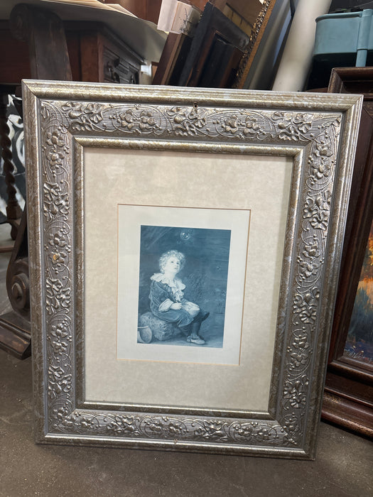 ORNATE SILVER FRAMED PAINTING OF BLUE BOY LOOKING UP