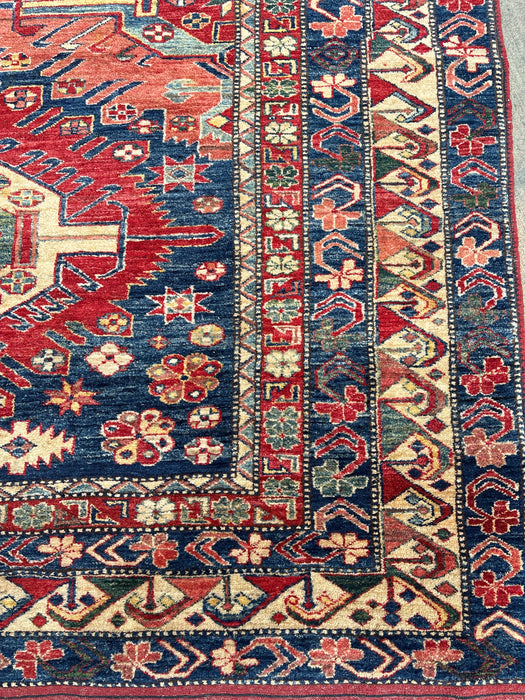HAND TIED RED, BLUE AND GREEN PERSIAN RUG
