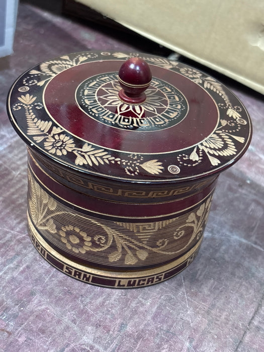 WINE RED MEXICAN CARVED AND LAQUERED CYLINDRICAL BOX
