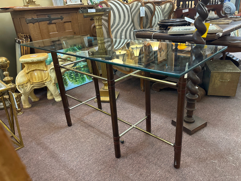 MIDCENTURY MCGUIRE WOOD, BRASS, AND RAW HIDE CONSOLE TABLE WITH GLASS TOP
