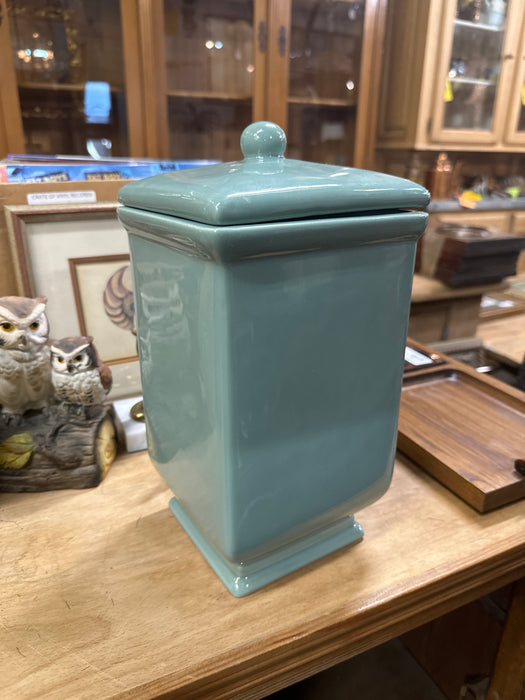 TALL GREEN CANNISTER WITH BIRD