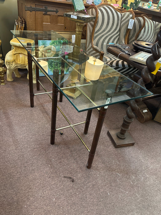 MIDCENTURY MCGUIRE WOOD, BRASS, AND RAW HIDE CONSOLE TABLE WITH GLASS TOP