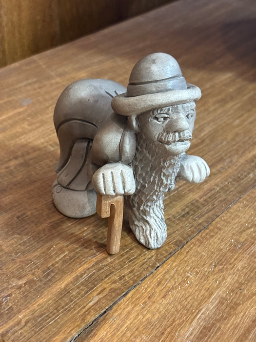 MAN WITH CANE POTTERY FIGURE