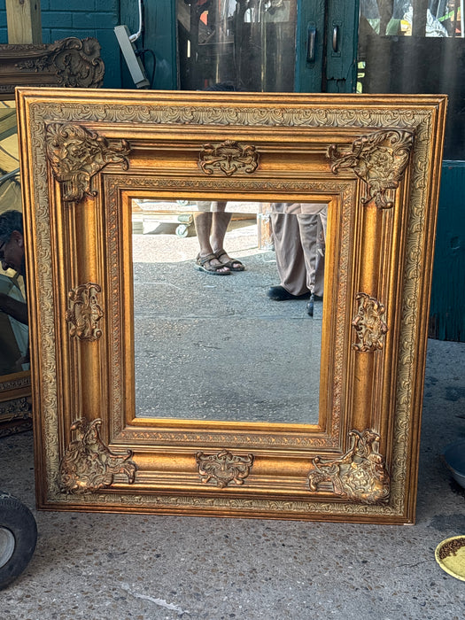 MEDIUM ORNATE GILT COMPOSITION BEVELED MIRROR