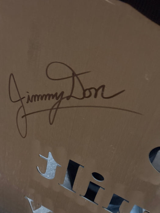 SIMPLE BLACK METAL PANEL "AND SO THEY BUILT A LIFE THEY LOVED" - SIGNED JIMMY DON