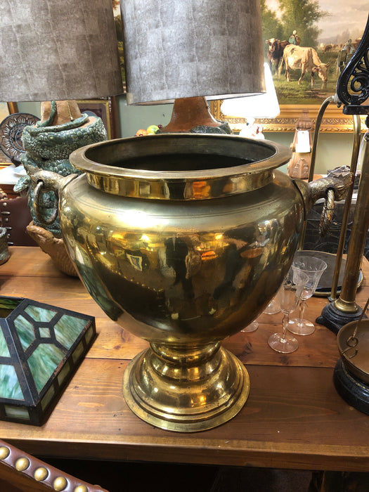 LARGE FOOTED BRASS URN WITH BIRD HANDLES