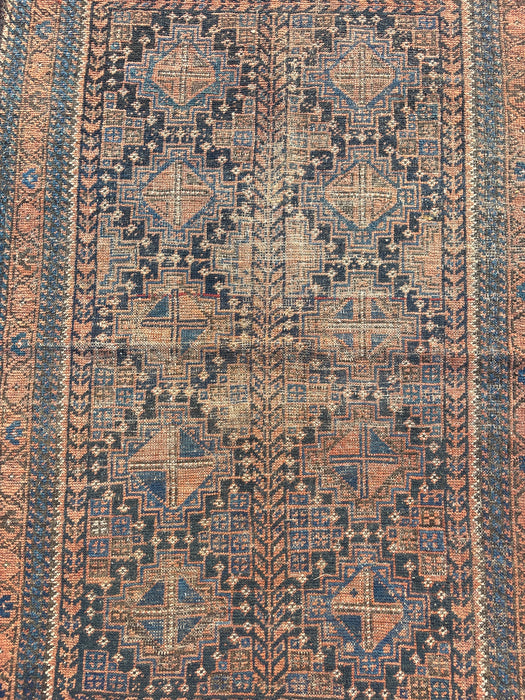 SMALL BLUE, BLACK AND ORANGE HAND TIED RUG