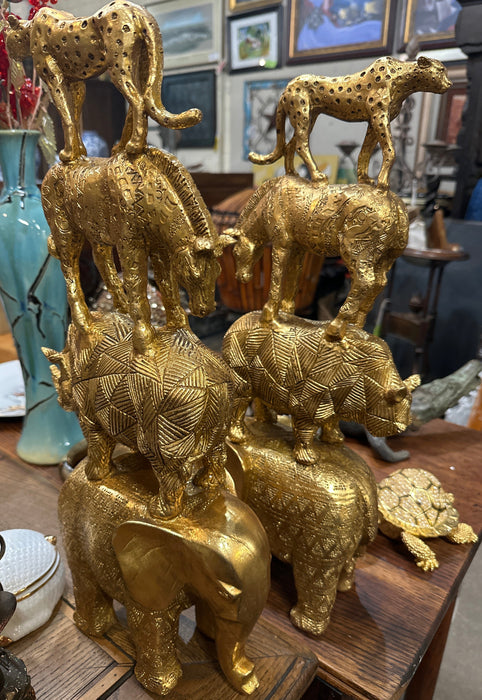 PAIR OF TALL GOLD STACKED AFRICAN ANIMALS