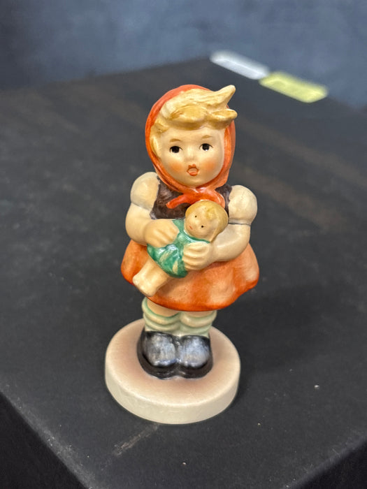 GIRL WITH DOLL HUMMEL